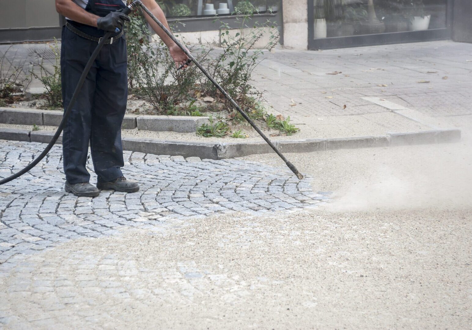 worker, cleaning the streets with a breeze of air